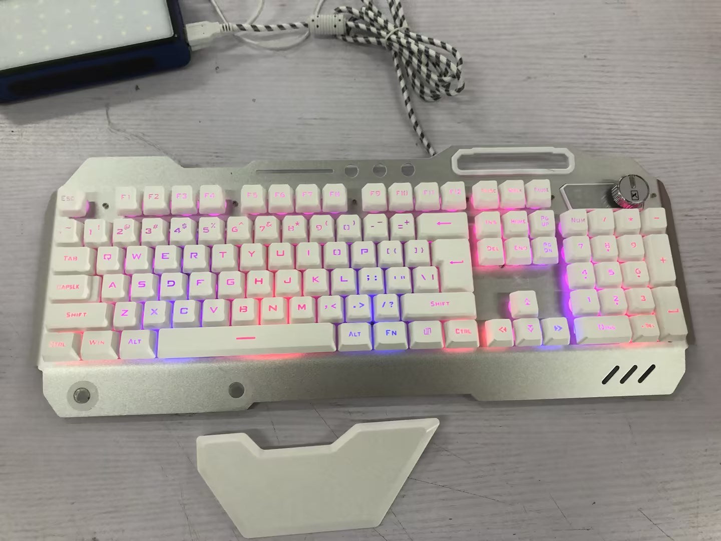 NT-001 Ergonomic Wired Gaming Keyboard with RGB Backlight and Phone Holder (Waterproof) Available in Black or White